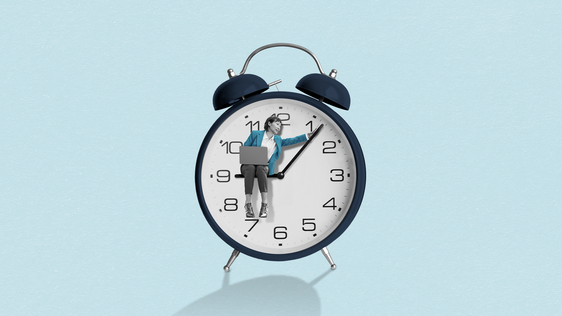 A person adjusting the hands of a large analog alarm clock with a sky blue background.