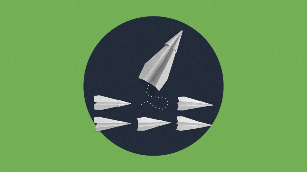 Two rows of paper airplanes move from the left to right; the top row's center airplane deviates from the pattern in an upward trajectory.