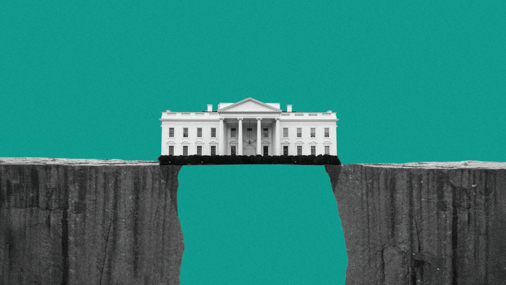 An institutional building creates a bridge between the edge of one cliff and the beginning of another.