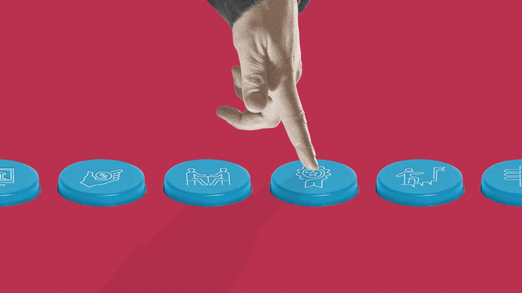 A closeup of a hand hovering over a line of blue buttons with icons on them.