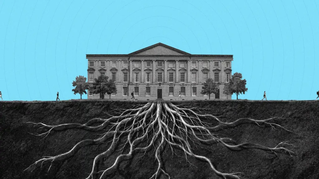 Deep tree roots radiate out from an institutional building.